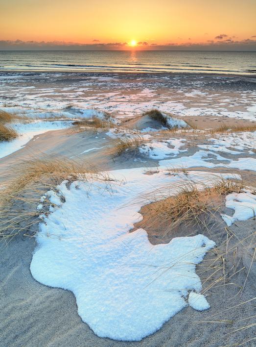 Sne på stranden